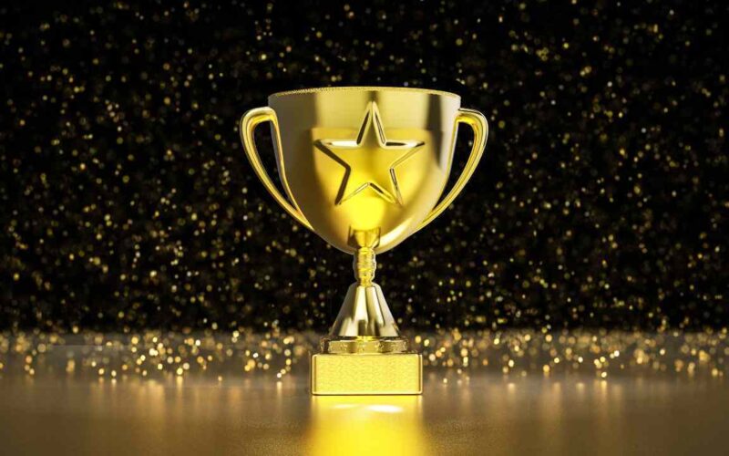 a gold trophy with a star on it/goodfirms-codewave casestudy